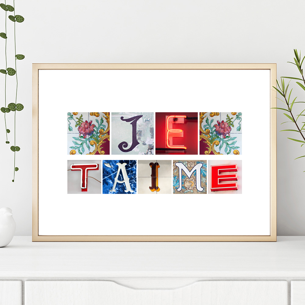 light wooden frame on shelf with colourful letters spelling the french phrase je T'aime