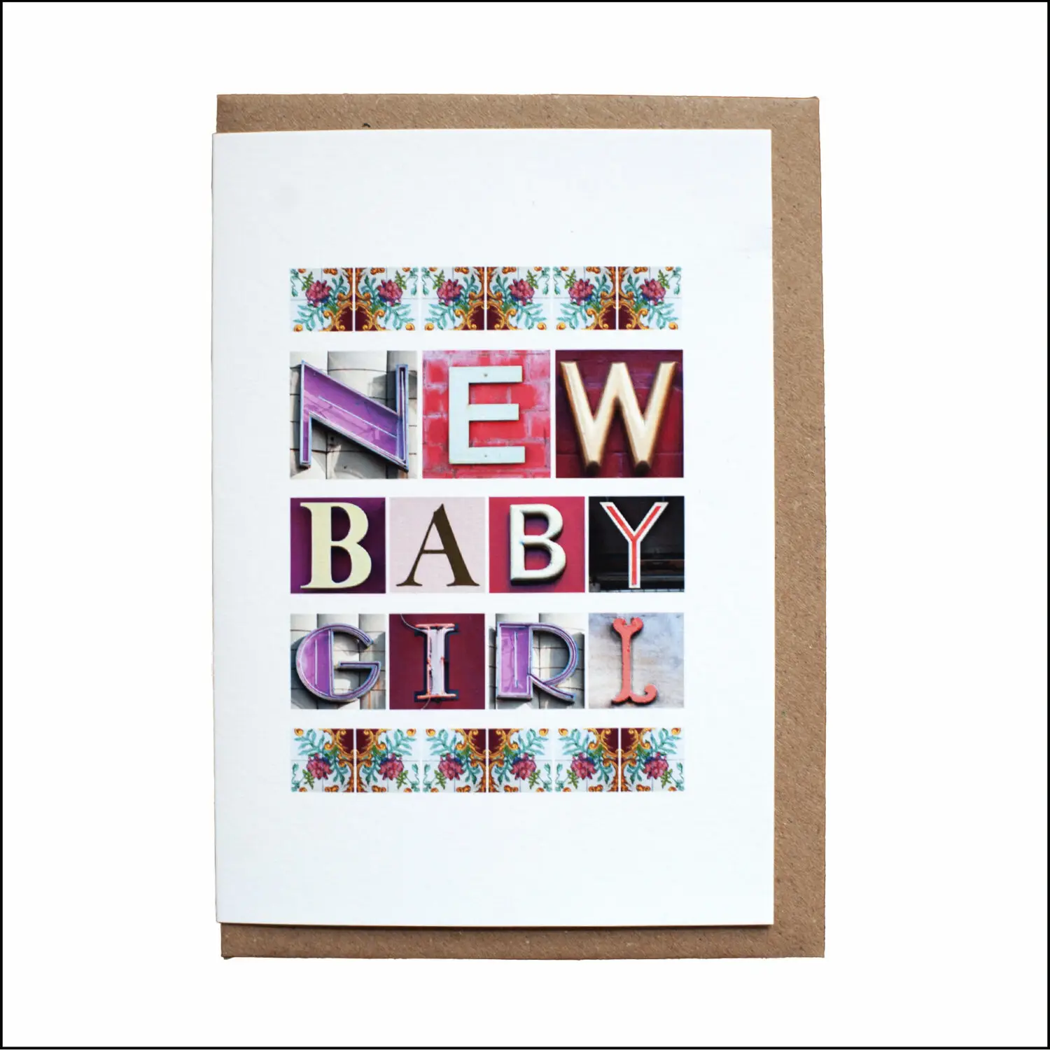 New baby girl greeting card created using letters photographed on buildings in the UK