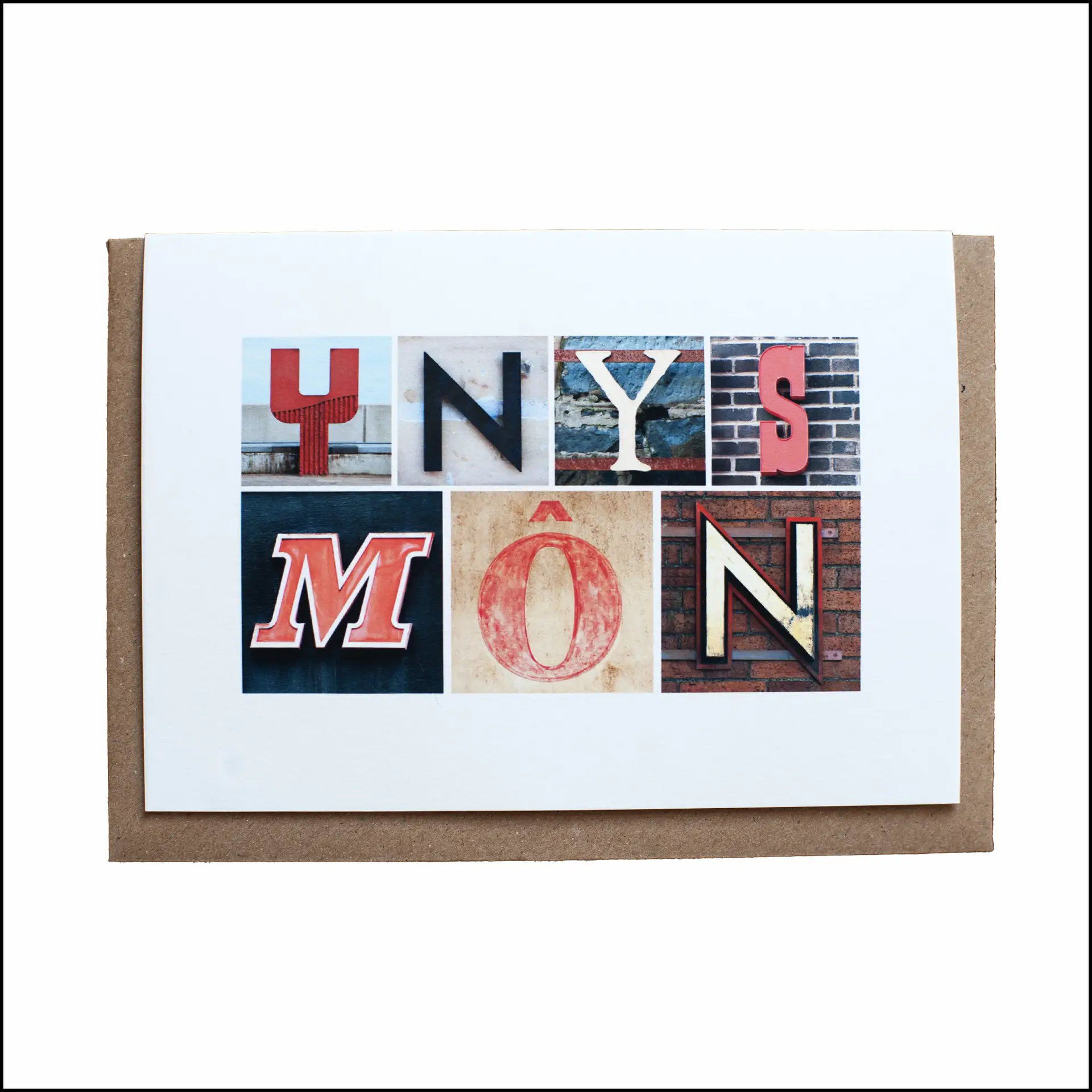Ynys mon greeting card created using letters photographed on buildings in north wales